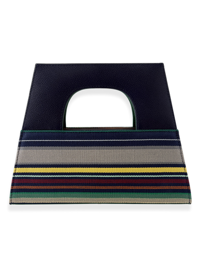 Striped bag with a navy top handle and colorful horizontal stripe bottom section by kuskaya and sold at qinti the peruvian Shop.