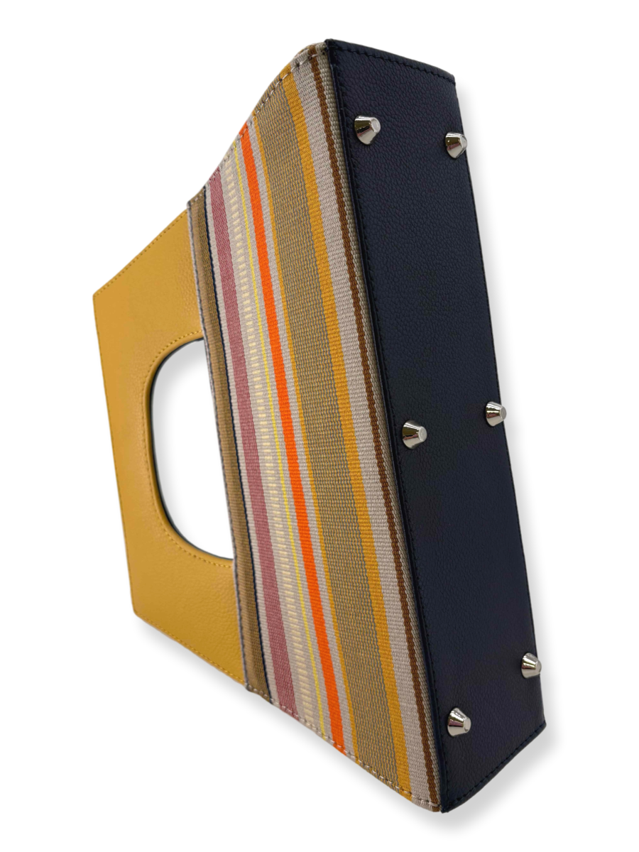 Luxury Peruvian Pima cotton A-handle handbag with yellow pebbled leather handle and multicolor woven striped design.