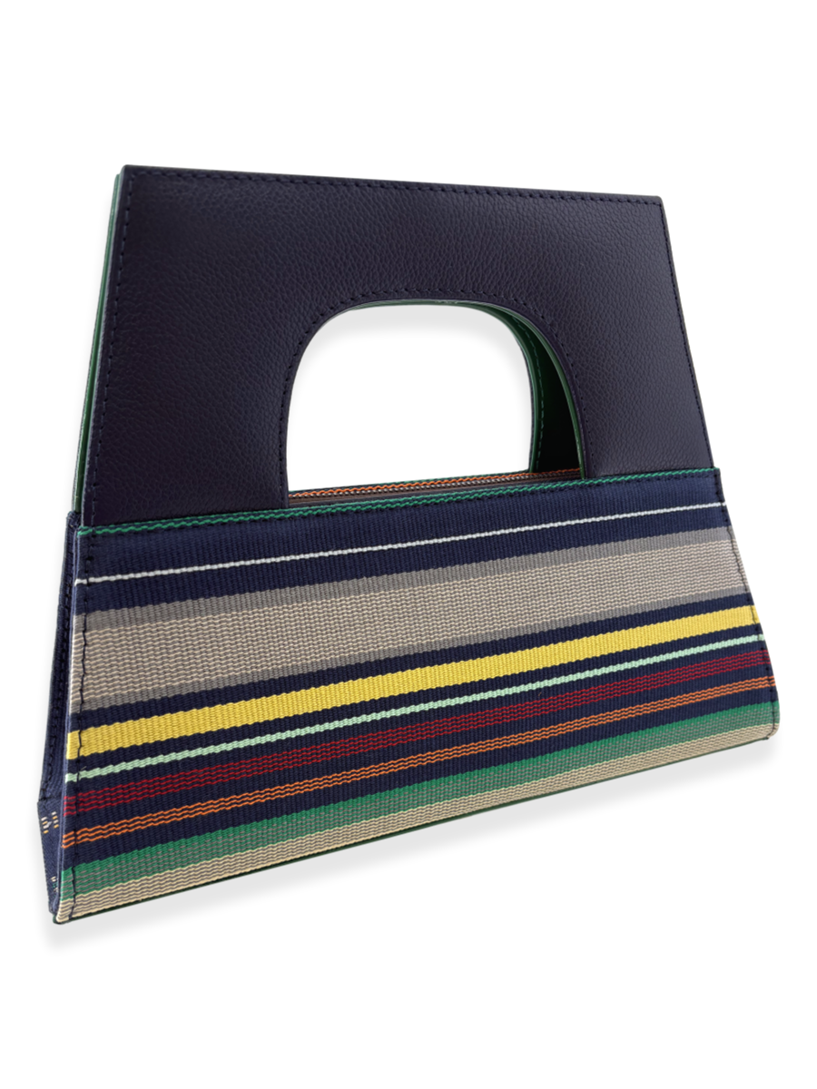 Navy handbag with multicolored striped pima cotton body and navy handle designed by kuskaya and sold at qinti the peruvian shop