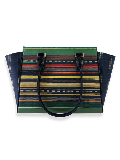 Striped handbag with a green top section and multicolored body on a white background