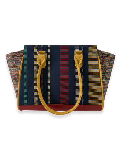 Amanda Grande designer handbag crafted from mercerized Peruvian Pima cotton with yellow leather handles, red leather base, and navy striped textile body, one-of-a-kind luxury handbag made in Peru.