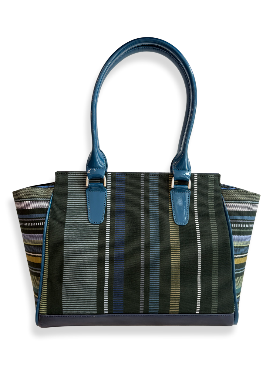 Amanda Grande Kuskaya handbag from Peru with structured silhouette, featuring dark green woven textile with vertical stripes in blue, white, gray, and chartreuse tones, complemented by glossy blue leather handles and trim; available at Qinti, The Peruvian Shop.