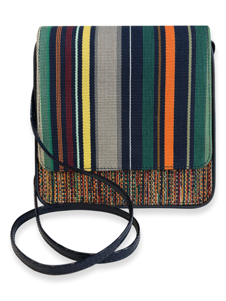 One-of-a-kind Cocktail crossbody handbag crafted from mercerized Peruvian Pima cotton with navy patent leather strap, smooth navy leather trim, and contemporary woven textile, made in Peru.