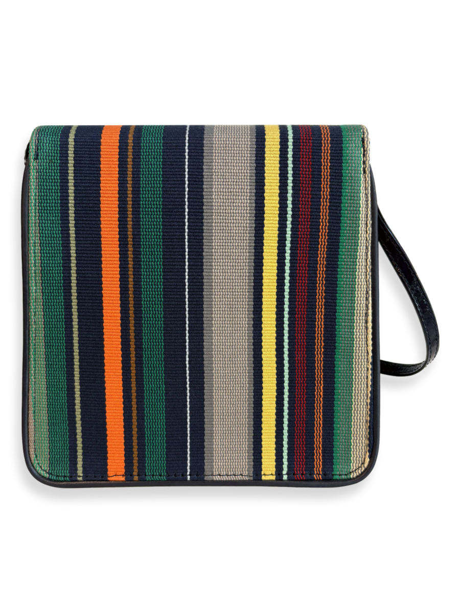 Back view of the Cocktail crossbody handbag handcrafted in Peru with handwoven mercerized Pima cotton, navy patent leather strap, and smooth navy leather trim.