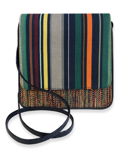 One-of-a-kind Cocktail crossbody handbag crafted from mercerized Peruvian Pima cotton with navy patent leather strap, smooth navy leather trim, and contemporary woven textile, made in Peru.