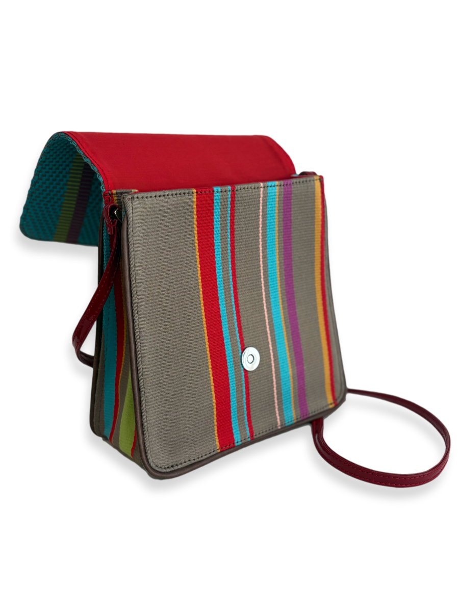 Multicolored striped crossbody bag With  a Red strap and Red Interior. One-of-a-kind Kuskaya handbag from Qinti The Peruvian Shop.