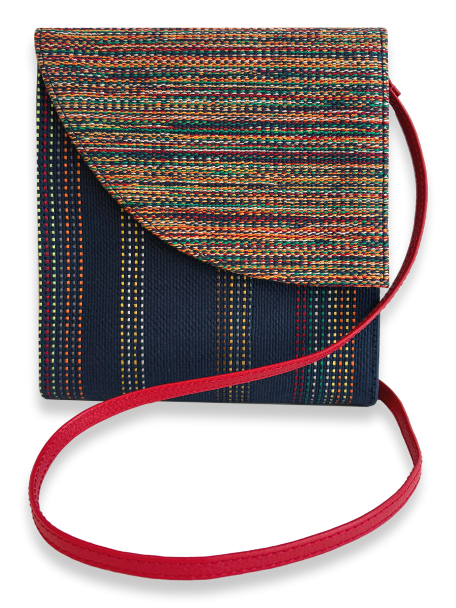 One-of-a-kind Pima cotton crossbody handbag by Kuskaya, featuring a multicolor woven flap, navy striped body, and red leather strap, available at Qinti The Peruvian Shop.