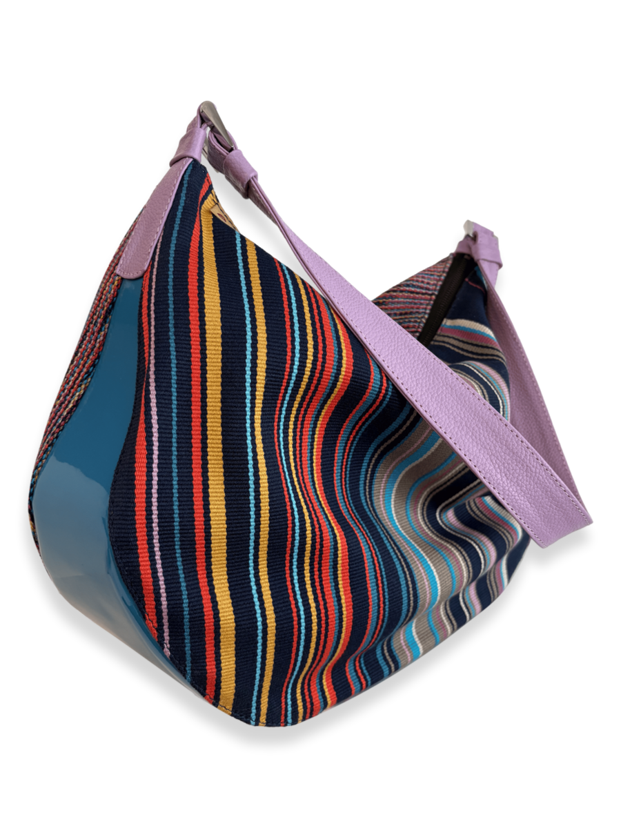 One-of-a-kind Kuskaya shoulder handbag, crafted from striped multicolor Pima cotton with smooth leather panels, a wide lilac leather strap, and a soft lilac interior; slouchy, crescent shape with artisanal Peruvian design - QINTI The Peruvian Shop