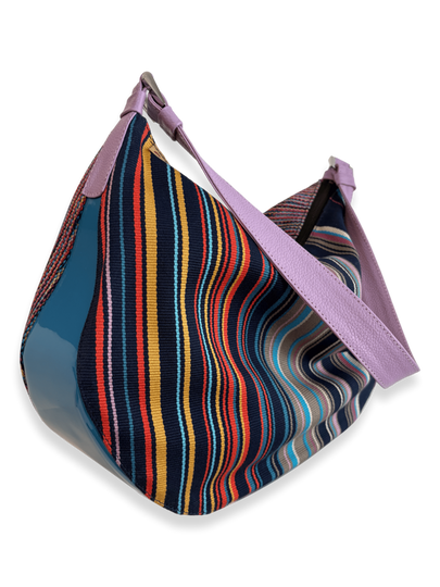 One-of-a-kind Kuskaya shoulder handbag, crafted from striped multicolor Pima cotton with smooth leather panels, a wide lilac leather strap, and a soft lilac interior; slouchy, crescent shape with artisanal Peruvian design - QINTI The Peruvian Shop