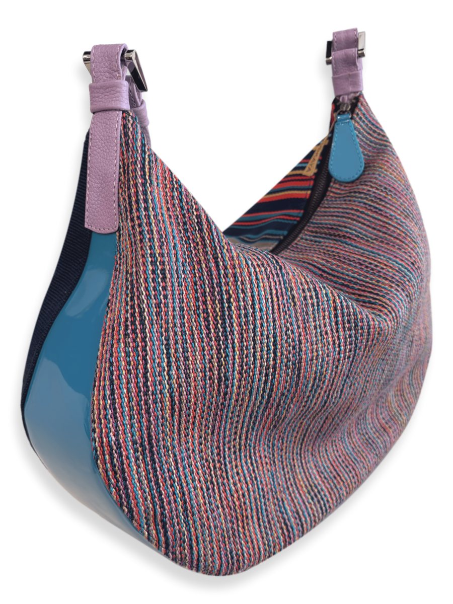 One-of-a-kind Kuskaya shoulder handbag, crafted from striped multicolor Pima cotton with smooth leather panels, a wide lilac leather strap, and a soft lilac interior; slouchy, crescent shape with artisanal Peruvian design - QINTI The Peruvian Shop