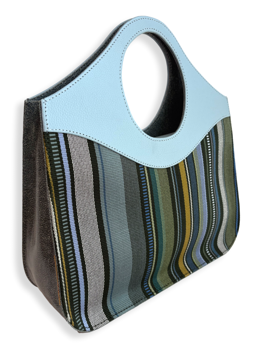 Kuskaya Handbag with Green base, and vertical stripes. powder blue pebbled leather Handle. One-of-a-kind Handbag from Qinti The Peruvian Shop.