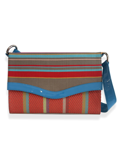 Multicolored striped bag with a blue strap made with mercerizedd pima cotton and patent leather. Designed by kuskaya and sold at qinti the pweruvian shop