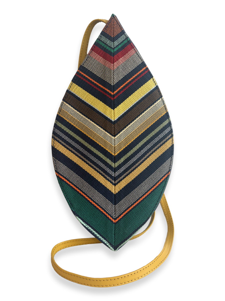 Hoja Navy Multi 01 Pima cotton crossbody handbag with colorful woven textile, smooth yellow leather strap and navy pebbled leather base, made in Peru.